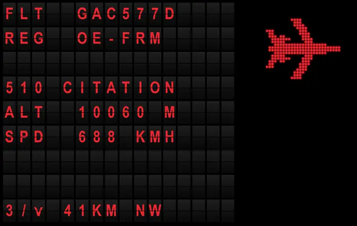 The split-flap board in red: the letters roll over from one flight to the next